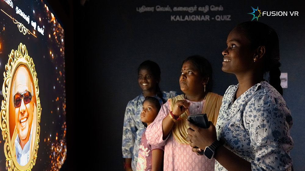 Interactive touch wall riddle quiz on Kalaignar's life and achievements